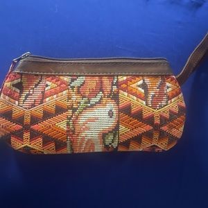 Nena & Co. woven clutch with leather strap